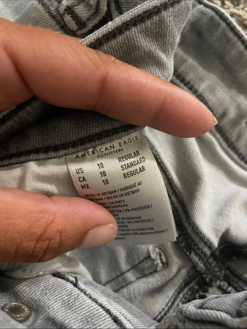 American Eagle Outfitters Light Gray Ripped Skinny Jeans